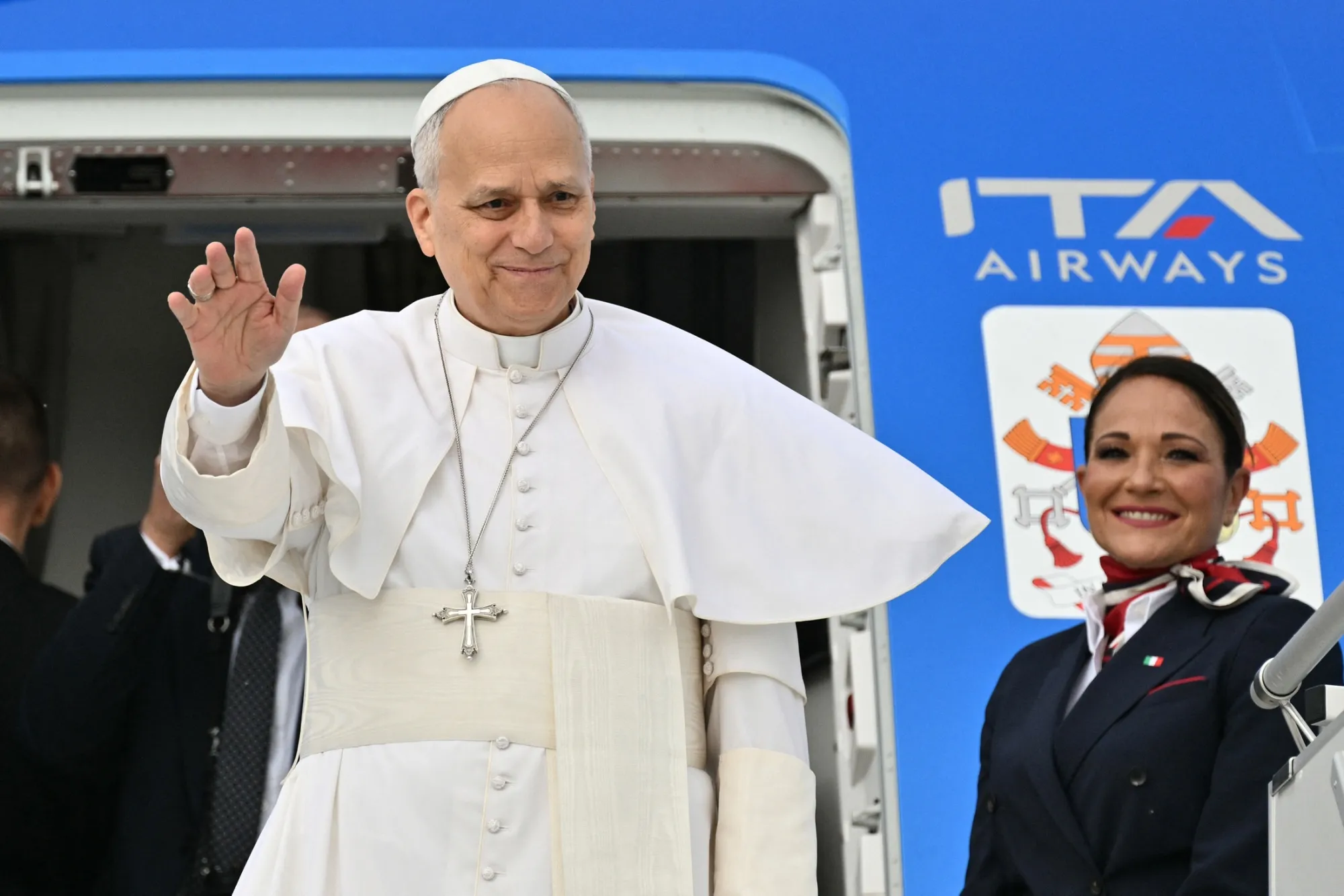 Pope Leo XIV boards his flight to Algiers, in Rome, on April 13.