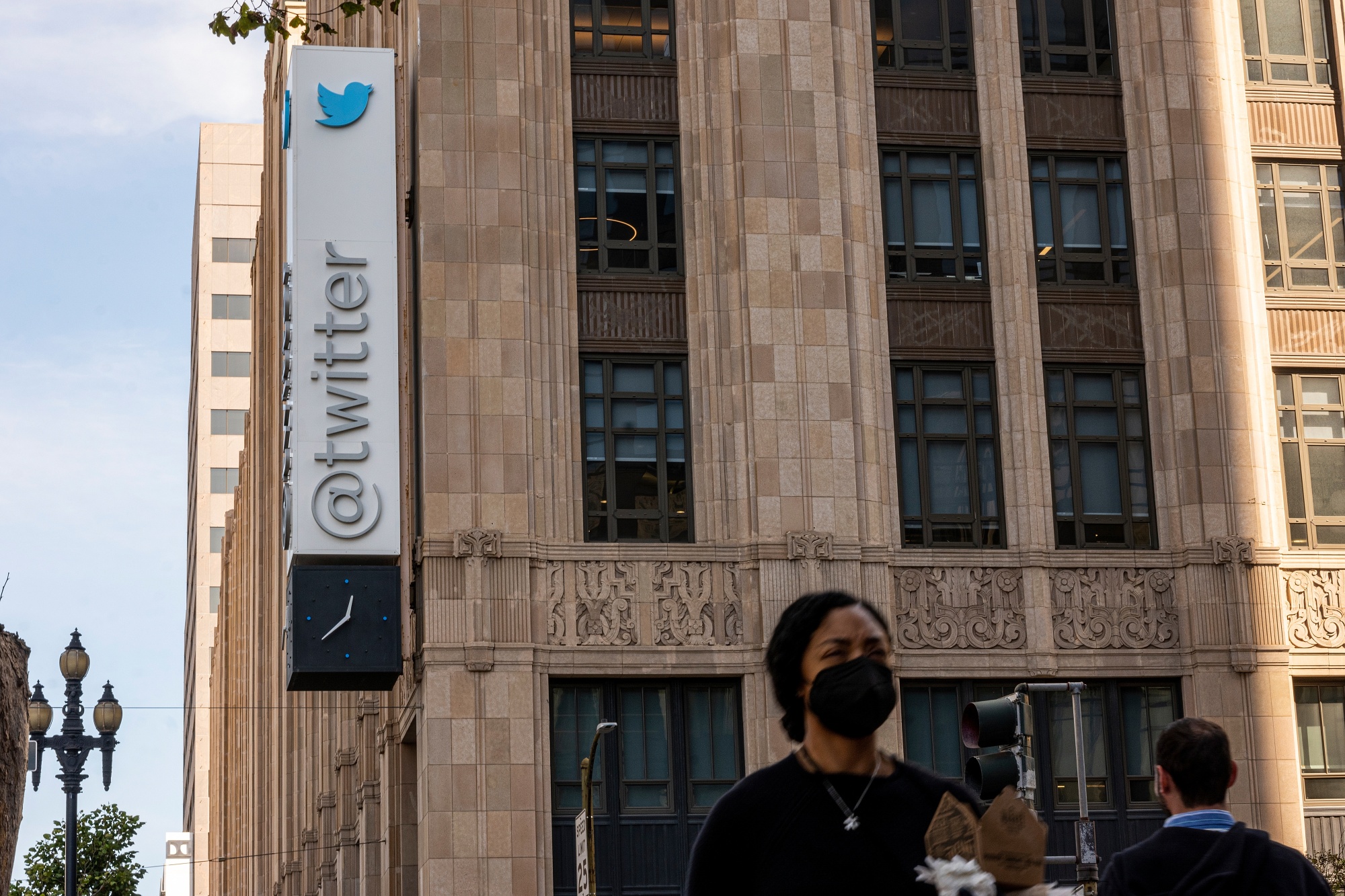 Pedestrians outside Twitter headquarters in San Francisco, California, US.