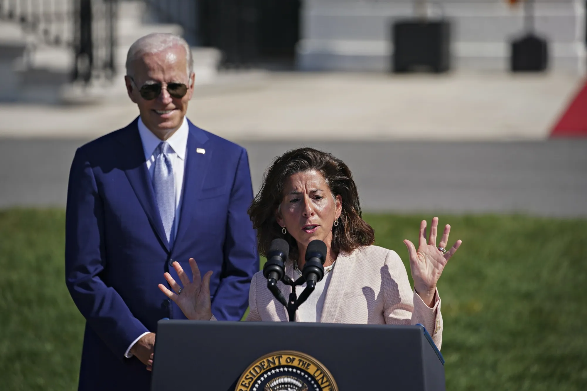 Gina Raimondo speaks alongside President Joe Biden during a signing ceremony for the Chips and Science Act, in Washington, DC, in 2022.