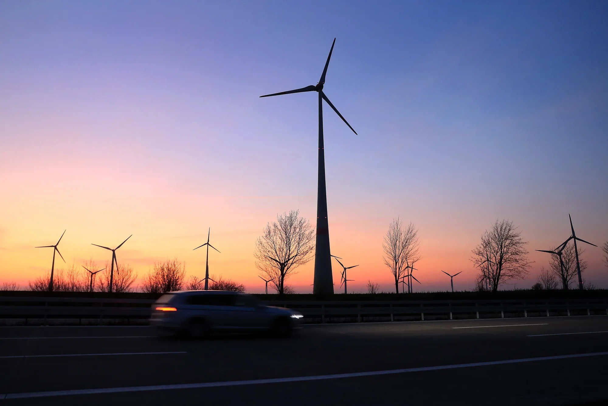 Wind turbines at sunset.
