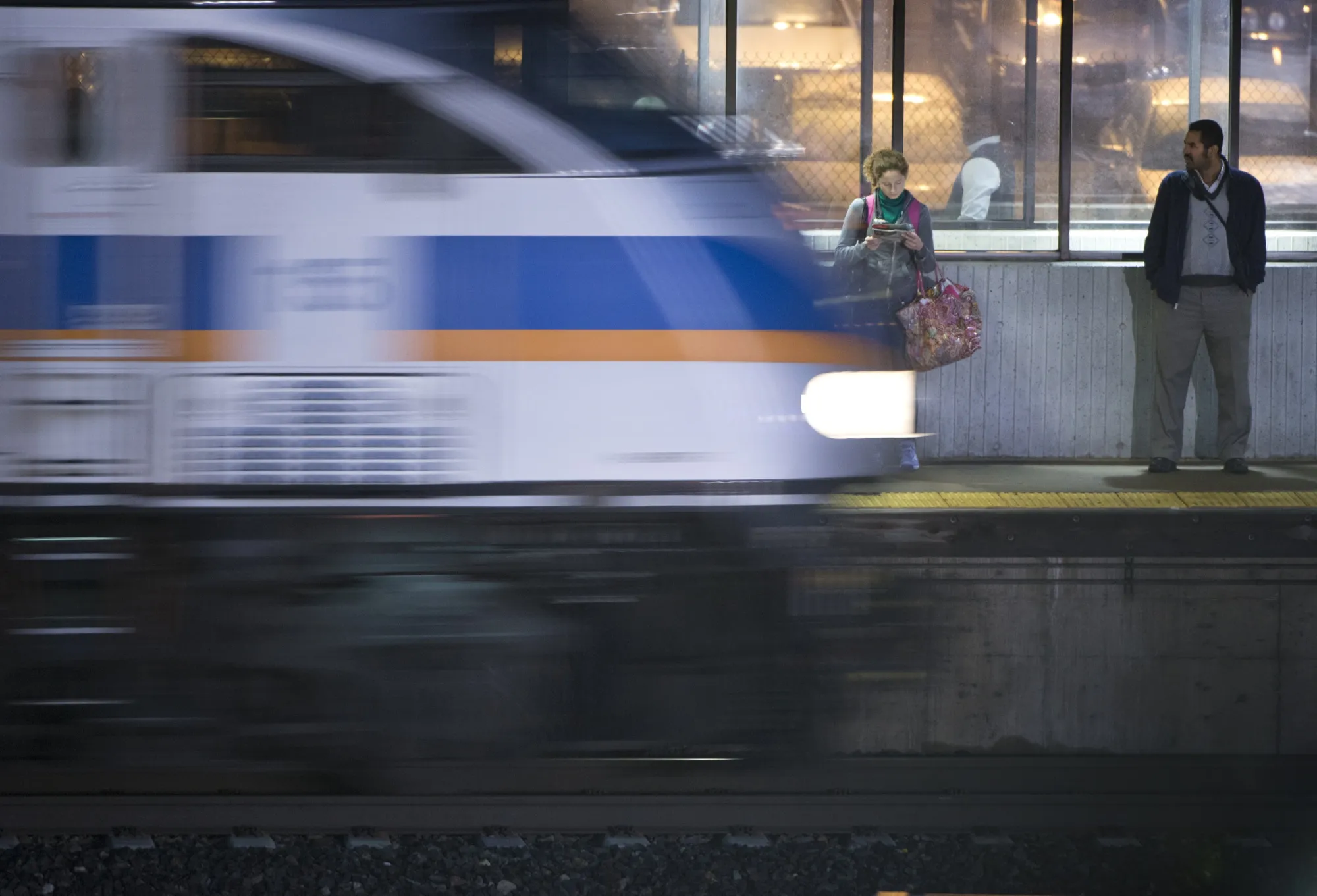 Morning commuters wait for the MARC and Amtrak trains in New Carrollton, Maryland.