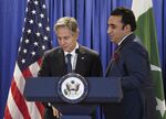 U.S. Secretary of State Antony Blinken and Pakistan's Foreign Minister Bilawal Bhutto-Zardari trade places to deliver remarks after their meeting, Monday, Sept. 26, 2022, at the State Dept. in Washington. (Kevin Lamarque/Pool via AP)