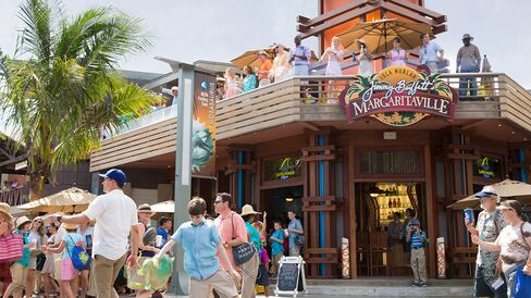 In Jurassic World, international visitors eat American-style at Jimmy Buffett's Margaritaville. Source: JurassicWorld.com via Bloomberg