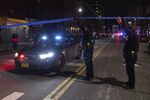 NYPD officers are seen at the site of a shooting in Harlem on Jan. 21.