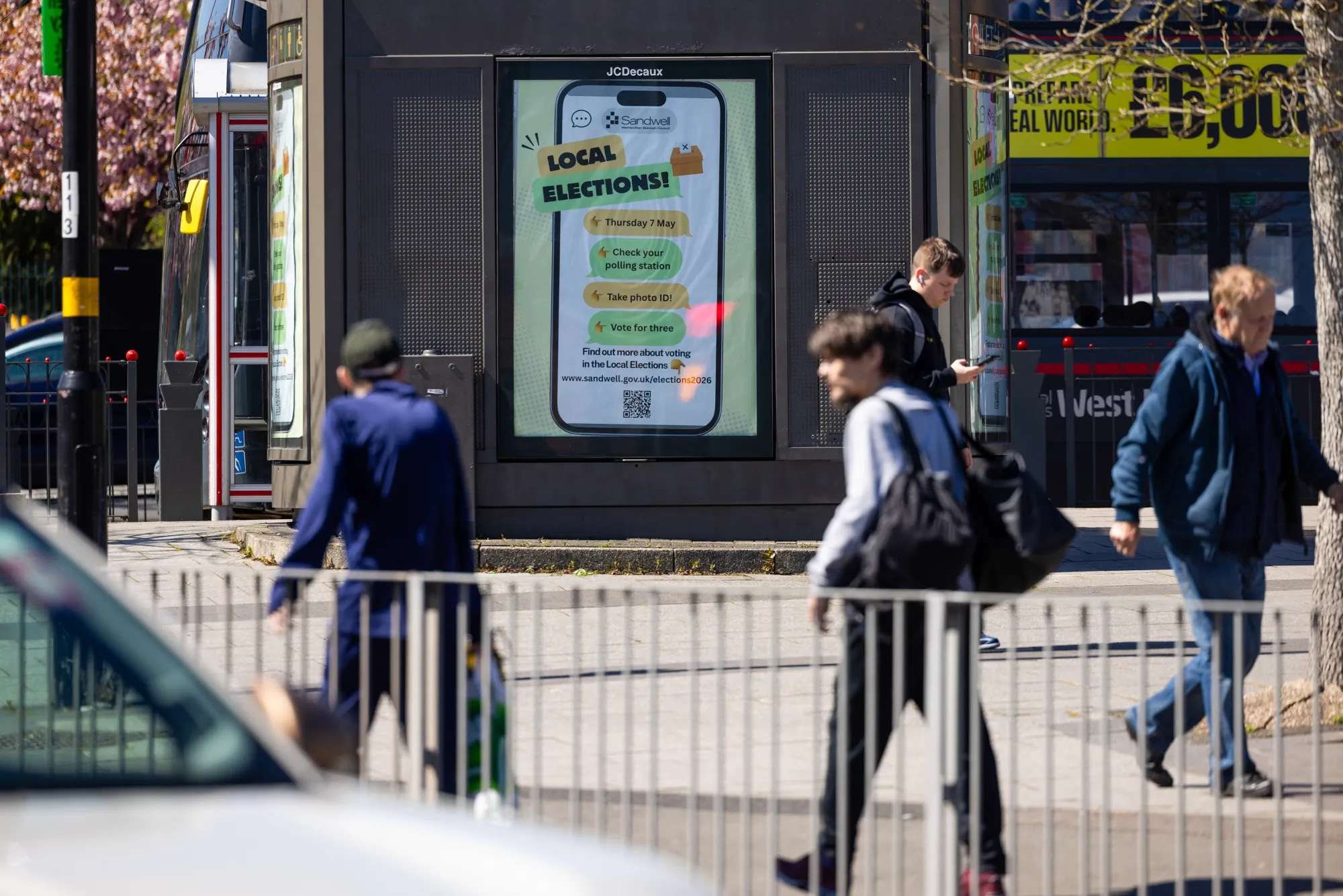 Adverts for how to vote in local elections in Birmingham, UK.