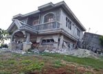 A damaged house after an earthquake in Itbayat, Batanes province, on July 27.