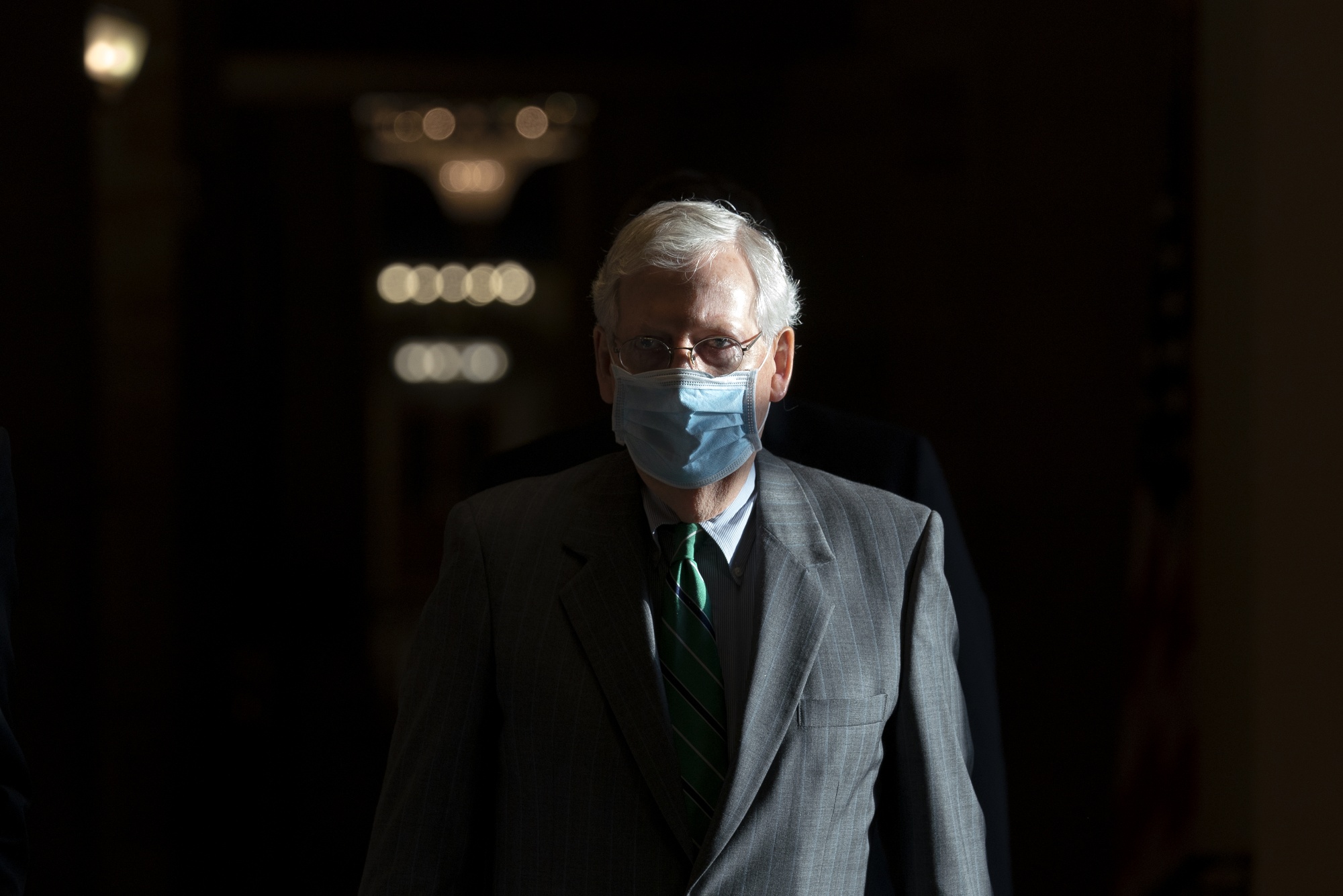 Mitch McConnell walks to the Senate Floor in Washington D.C., on Sept. 8.