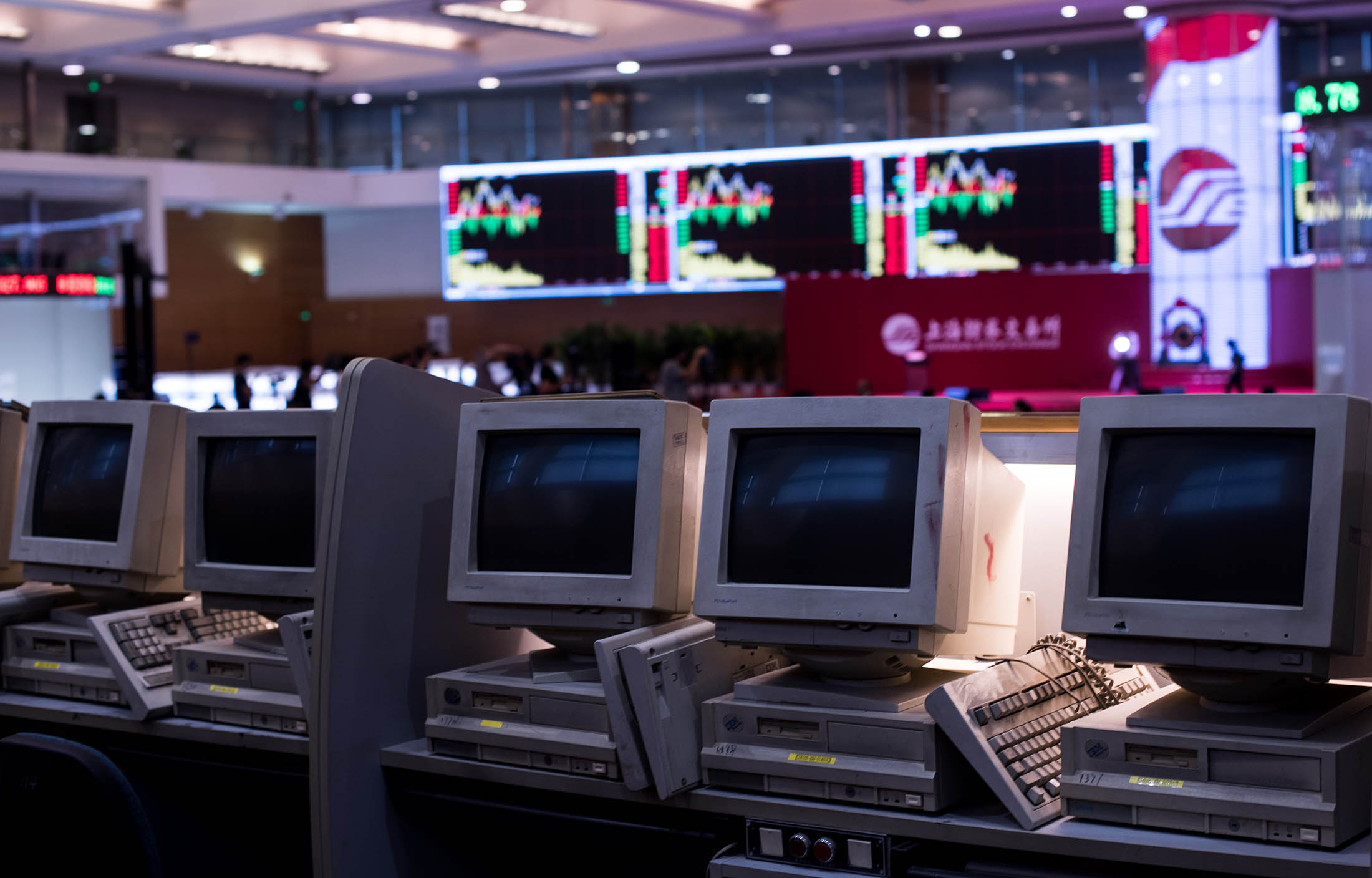 Empty desks and computers on the trading floor at the Shanghai Stock Exchange.
