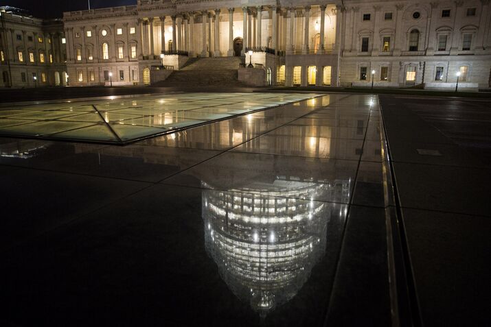 Views Of The U.S. Capitol Building As Congress Looks For Agreement On Long-Term Spending Bill