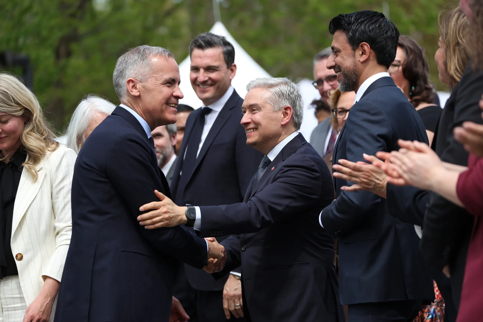 Mark Carney, Canada's prime minister, shakes hands with Francois-Philippe Champagne, his&nbsp;finance minister, after a swearing-in ceremony at Rideau Hall in Ottawa on May 13.