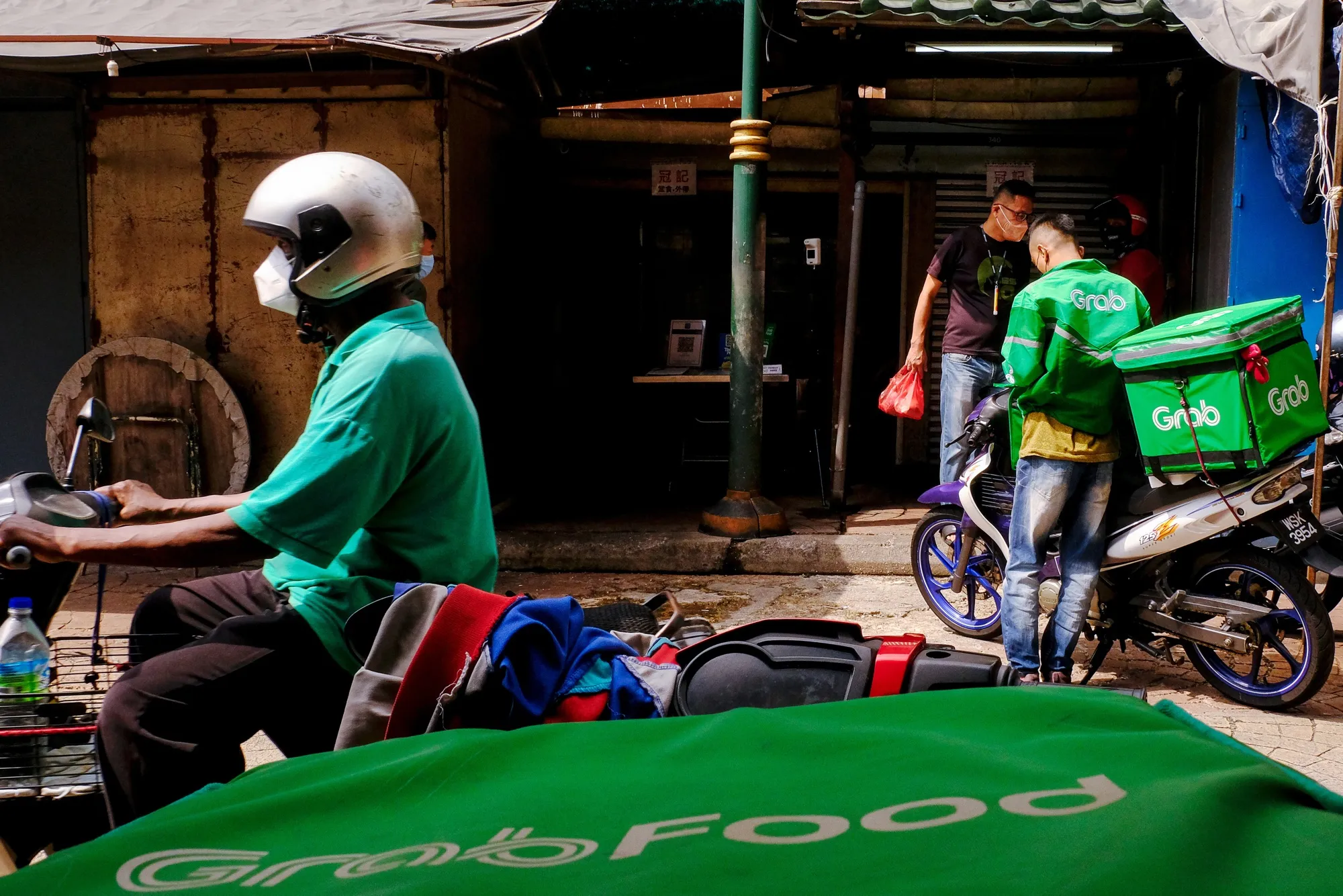Grab Shares Jump as Breakeven Nears a Decade After Founding - Bloomberg