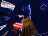 Banners, Union and EU flags are displayed outside the Houses of Parliament in London on October 22, 2019.