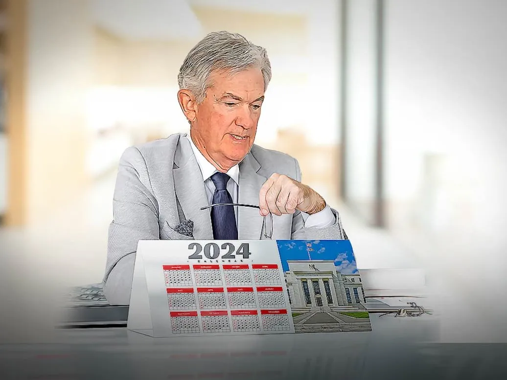 IMAGE_POWELL_SITTING_BY_CALENDAR