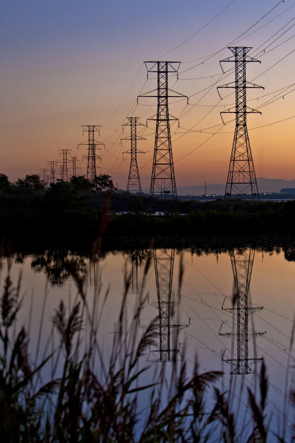 Power transmission lines are suspended from electricity pylons in Kearny, New Jersey, U.S.