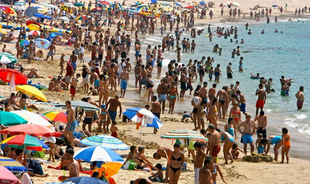 Remember crowded beaches? We’ll be there again soon.