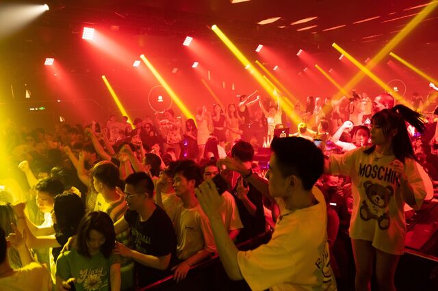 Revelers dance without masks at a nightclub in Wuhan in early August.