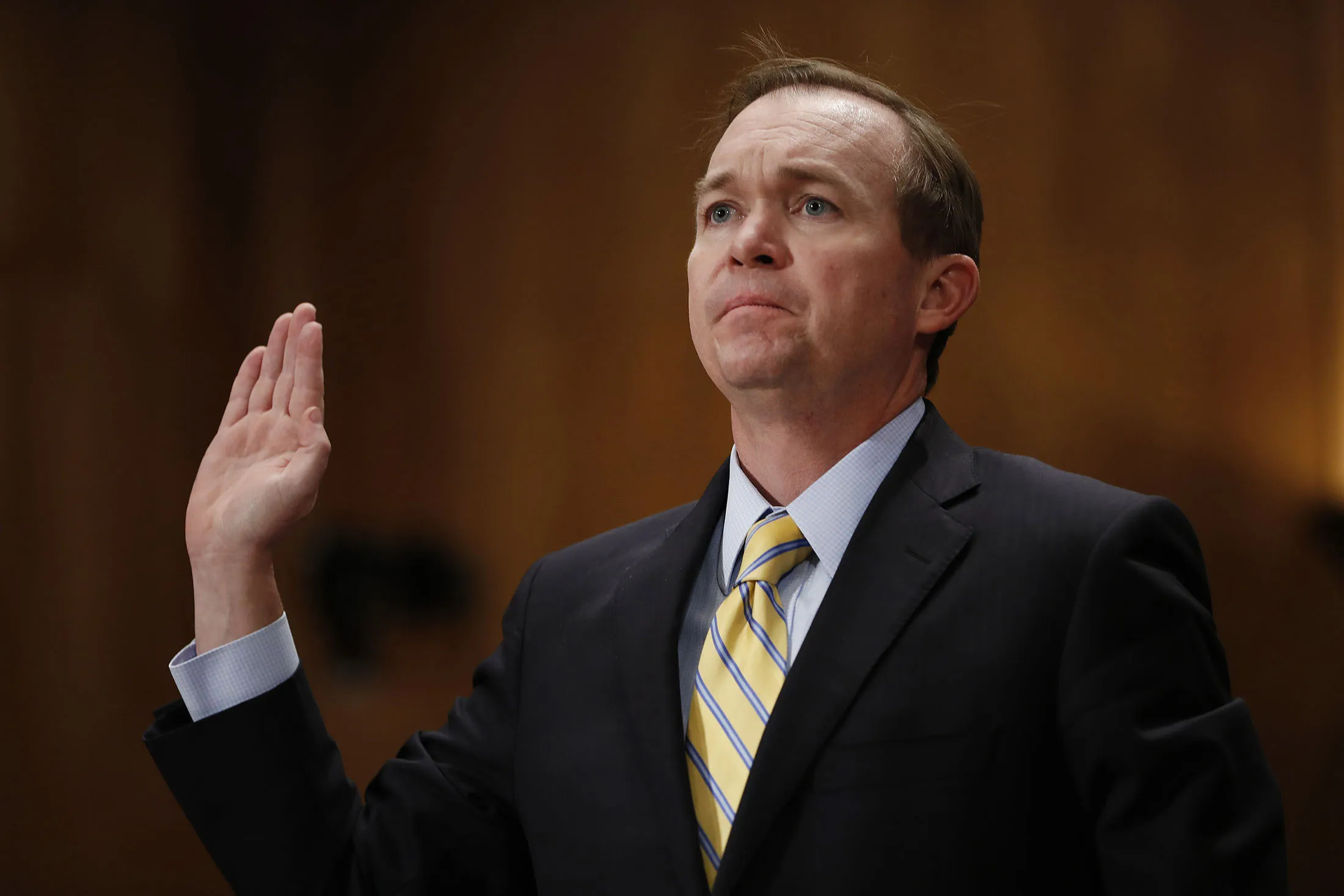 Representative Mick Mulvaney is sworn in during a Senate Governmental Affairs Committee confirmation hearing in Washington, D.C., on Jan. 24.

