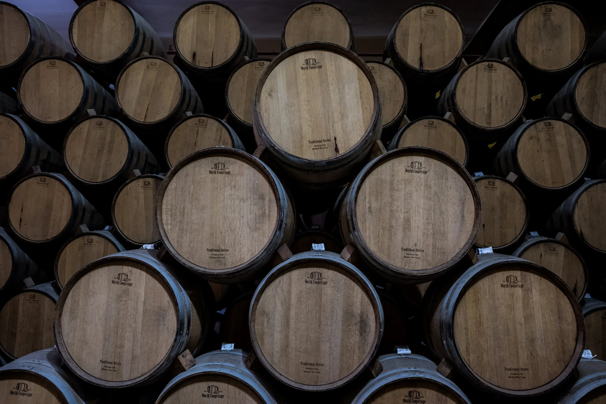 Barrels of tequila sit to age at the Becle SAB Jose Cuervo distillery in the town of Tequila, Jalisco state, Mexico.