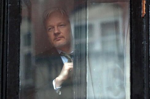 Assange preparing to speak from the balcony of the Ecuadorian embassy on February 5, 2016 after the United Nations Working Group on Arbitrary Detention has insisted that he be released.