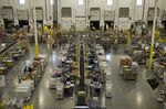Employees process customer orders at an Amazon.com&nbsp;fulfillment in Tracy, California.