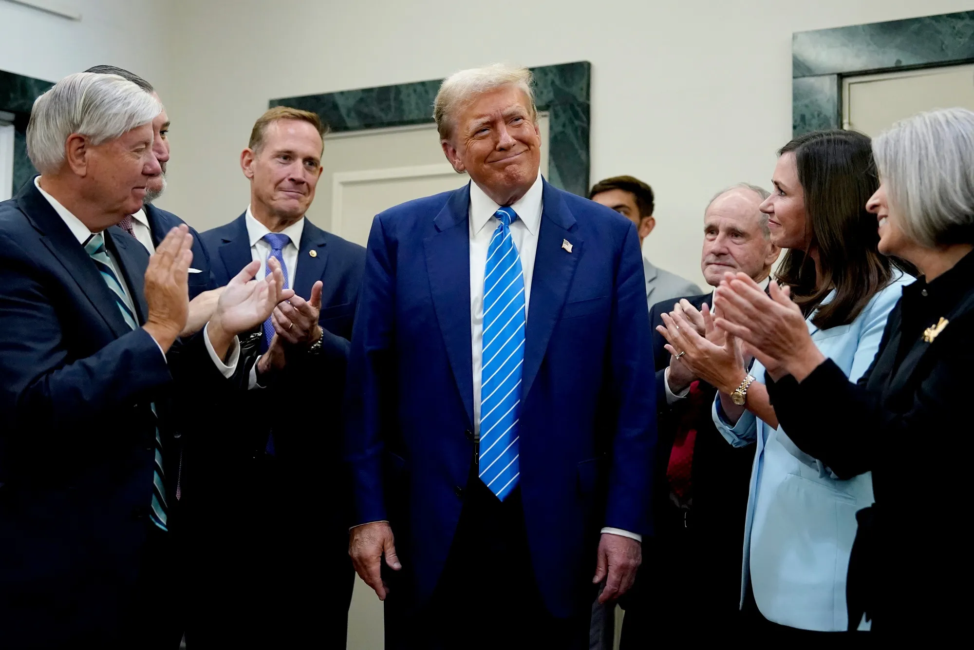 Donald Trump following a meeting with Senate Republicans at the National Republican Senatorial Committee office in Washington, DC on June 13.