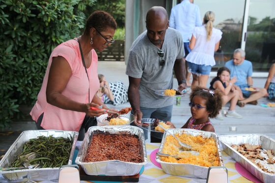 Ex-NBA Star Charles Oakley Whips Up a Meal for Finance Dad in Hamptons