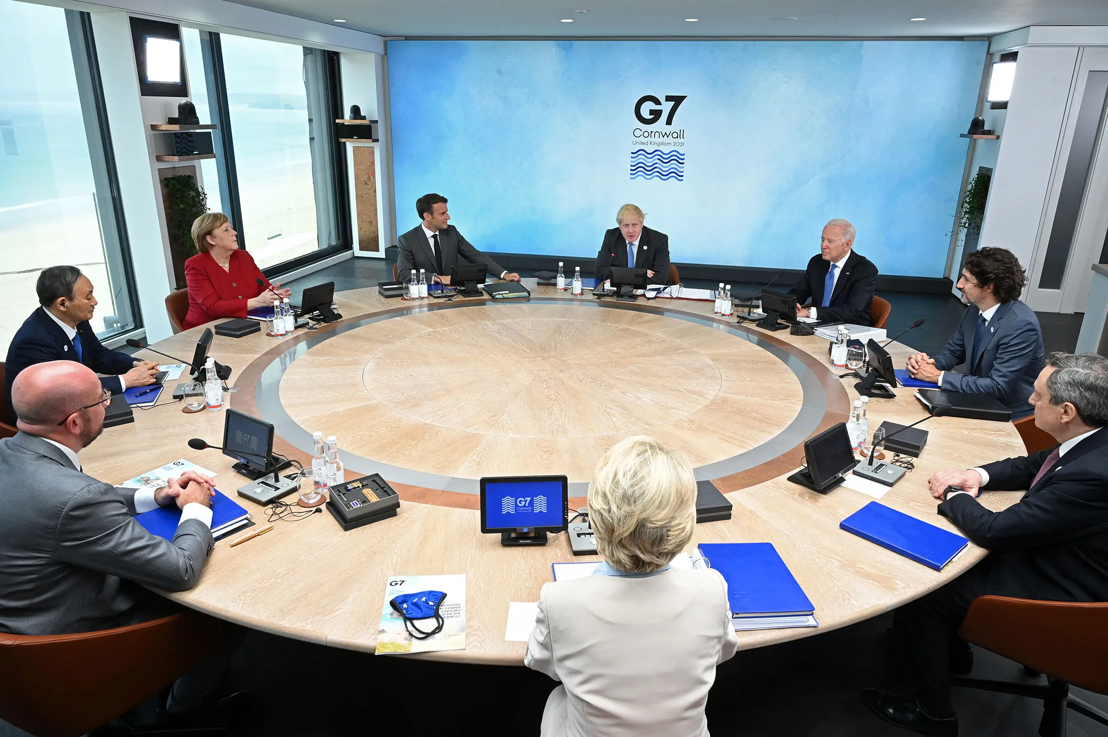 G-7 leaders attend a round-table summit in Carbis Bay, U.K. on June 11.&nbsp;The group backed away from setting a firm date to stop burning coal.
