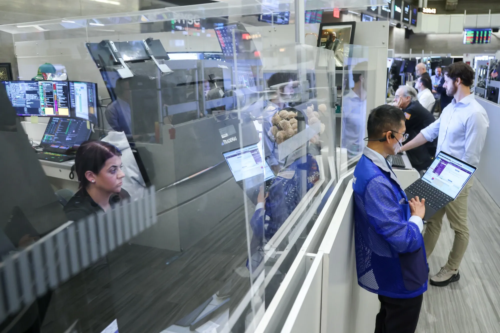 Traders work on the floor of the&nbsp;New York Stock Exchange.