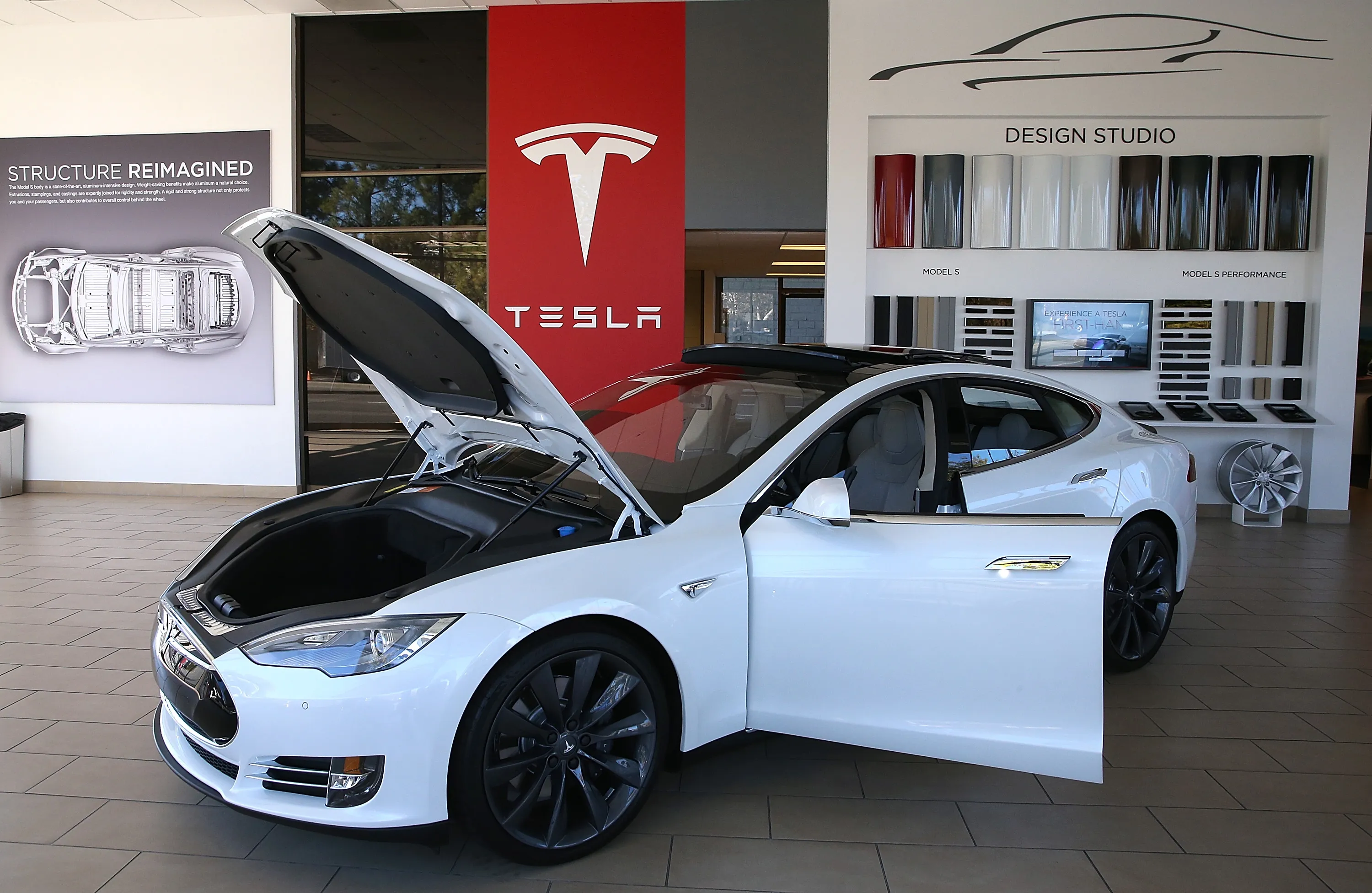 A Tesla Model S car is displayed at a Tesla showroom.