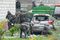 Officials at the site of a property struck by drone debris, in Wyryki, Poland, on Sept. 11.