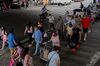 Pedestrians wearing protective masks cross a street in the Corona neighborhood in the Queens borough of New York, U.S., on Saturday, June 27, 2020. New York's public transport usage has risen to almost half the typical level before the coronavirus outbreak, a recovery that has yet to extend to the restaurant industry.