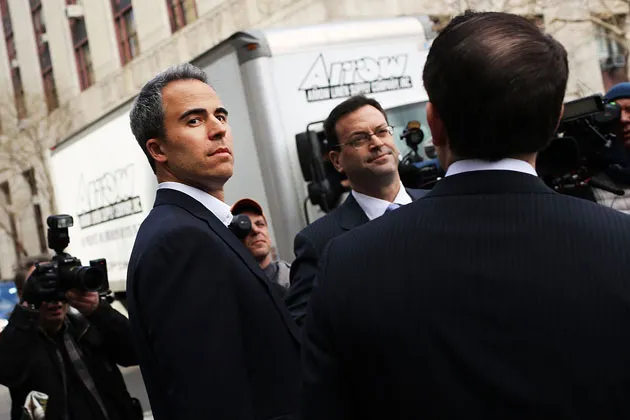 SAC portfolio manager Michael Steinberg walks out of a New York courthouse on March 29 after being charged by U.S. prosecutors with insider trading