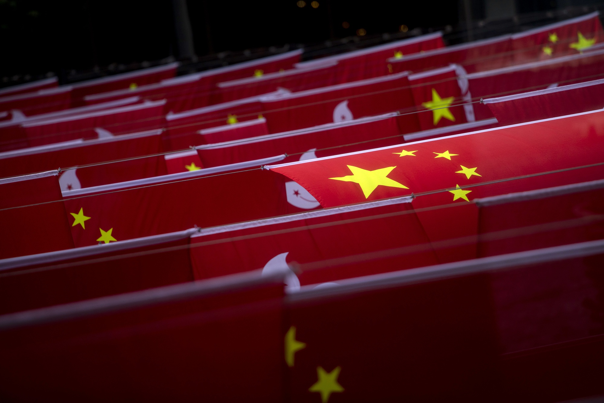 Hong Kong Bans Replacing China Flag s Stars With Virus Shapes Bloomberg Hong Kong Bans Replacing China Flag s Stars With Virus Shapes Bloomberg