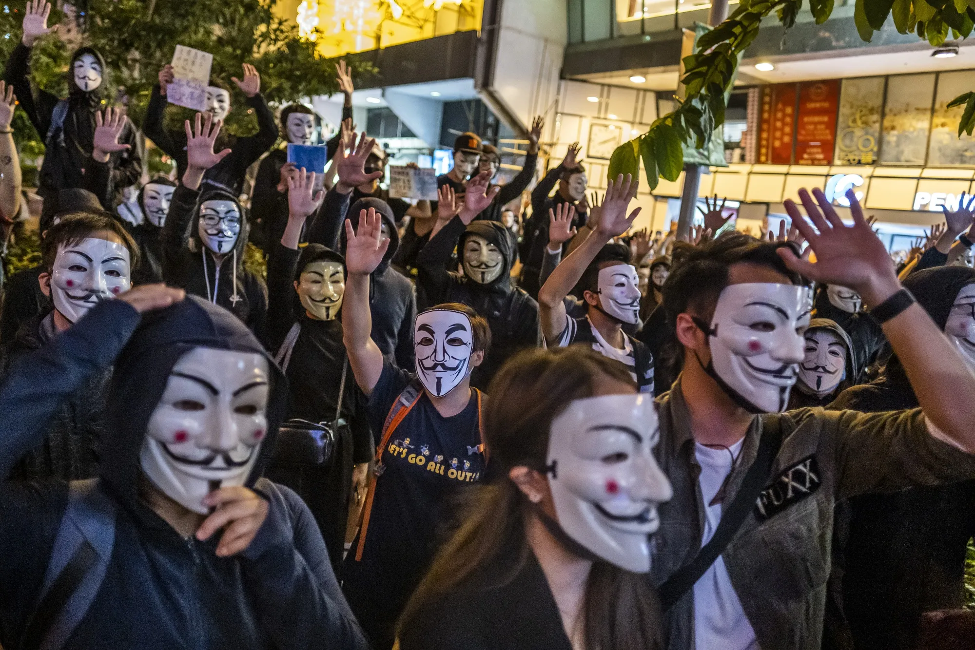 Demonstrators wearing anonymous masks, also known as Guy Fawkes masks during a protest in Tsim Sha Tsui on Nov. 5.