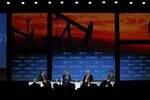 Pedro Joaquin Coldwell, Mexico's energy secretary, second left, speaks as Carlos Pascual, senior vice president of IHS Inc., left, Jim Carr, Canada's minister of natural resources, second right, and Rick Perry, U.S. secretary of energy, listen during the 2018 CERAWeek by IHS Markit conference in Houston, Texas, on Wednesday, March 7, 2018.
