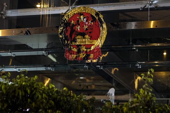 Hong Kong Tempts China’s Ire as Protests Take More Violent Turn