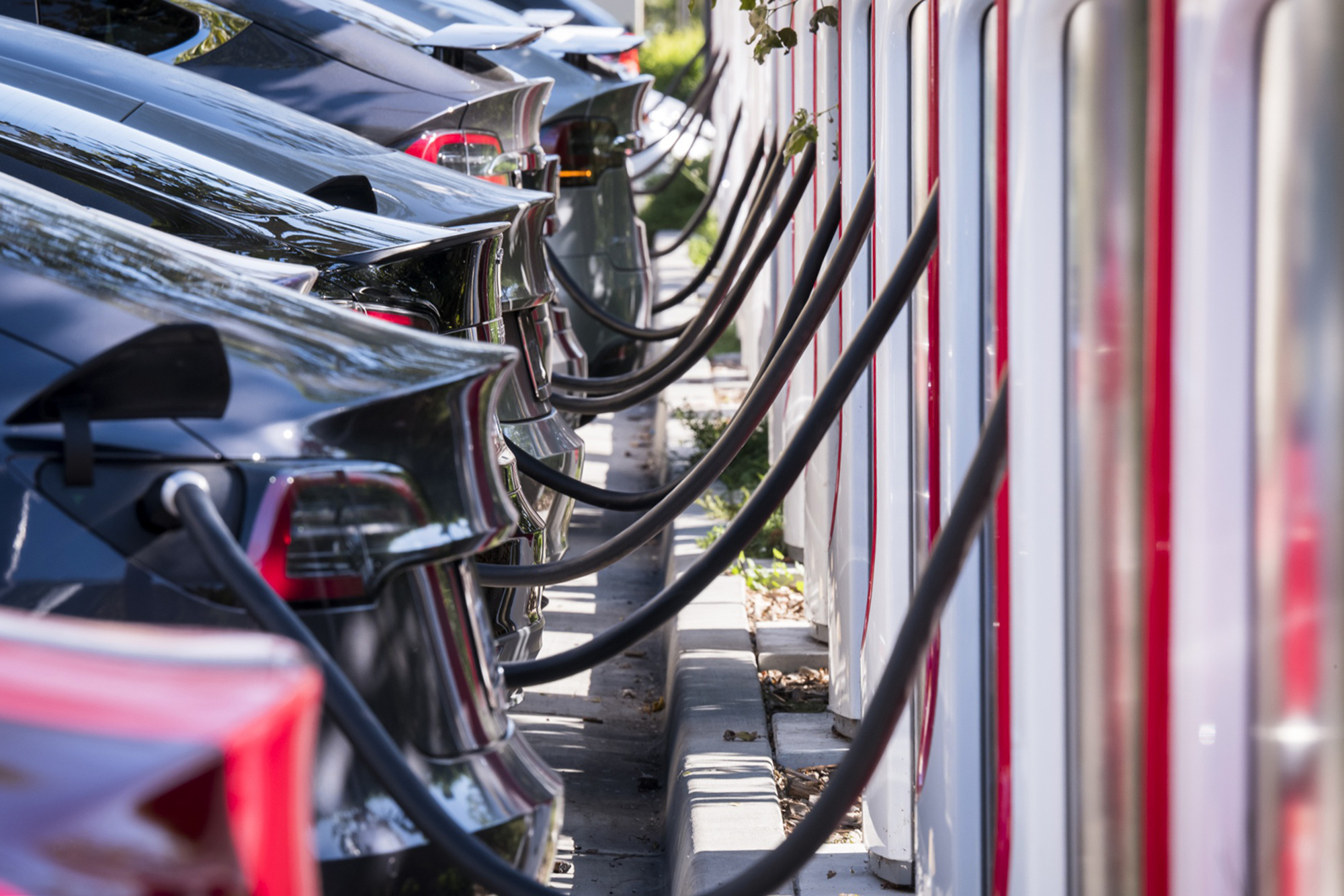 Tesla vehicles at a Tesla Supercharger station in Concord, California.