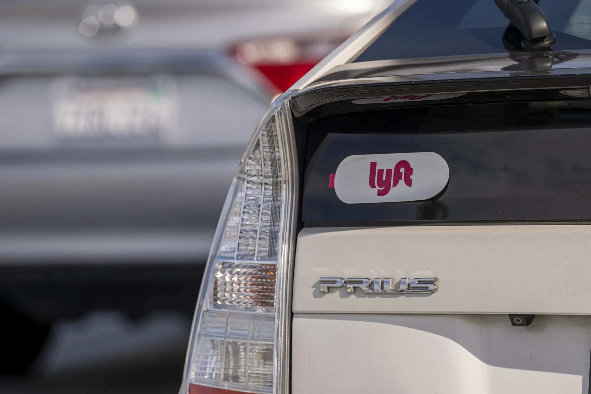 Lyft signage on a vehicle as it exits the ride-sharing pickup at San Francisco International Airport in California.&nbsp;