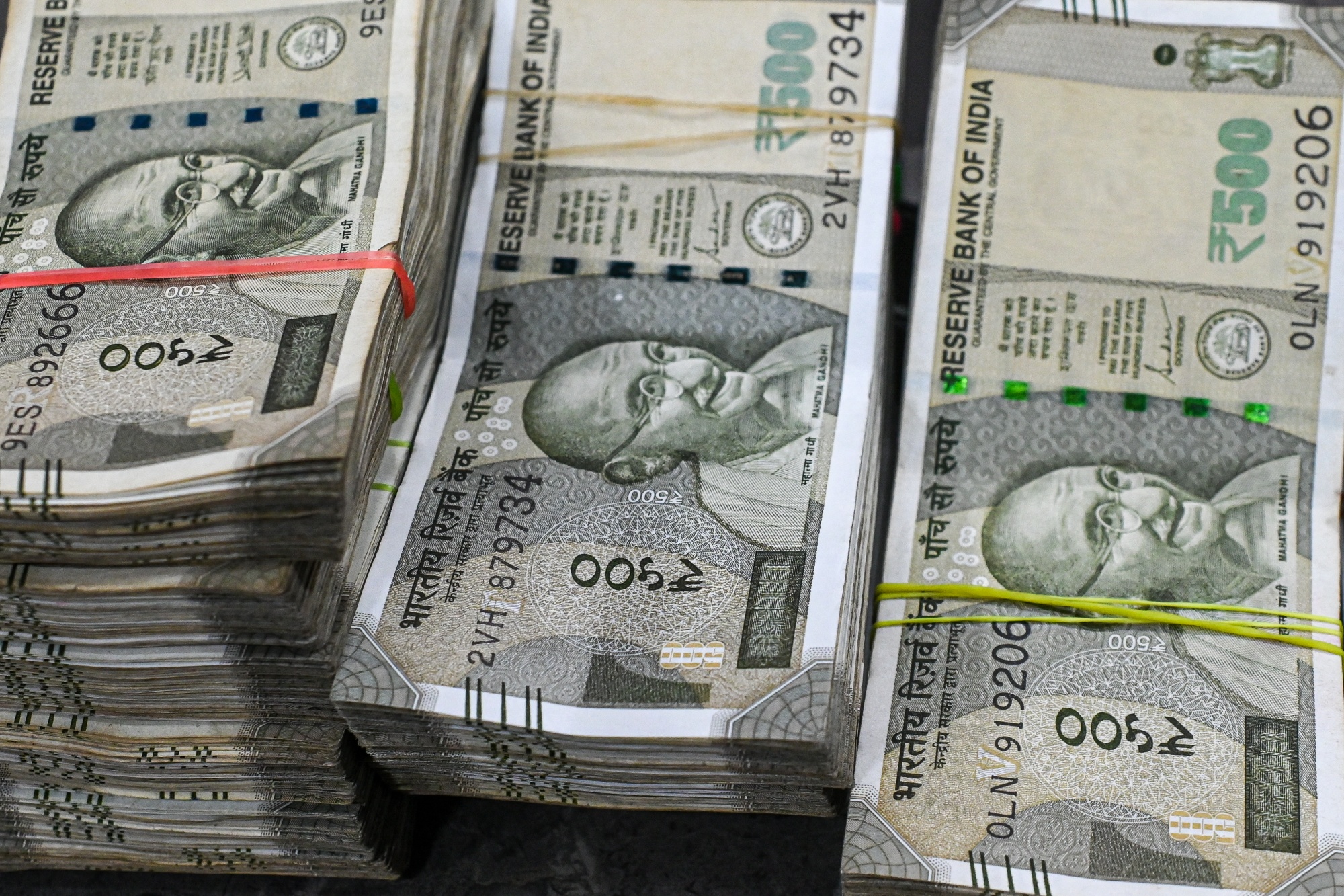 Bundles of rupee banknotes in New Delhi. Photographer: Prakash Singh/Bloomberg