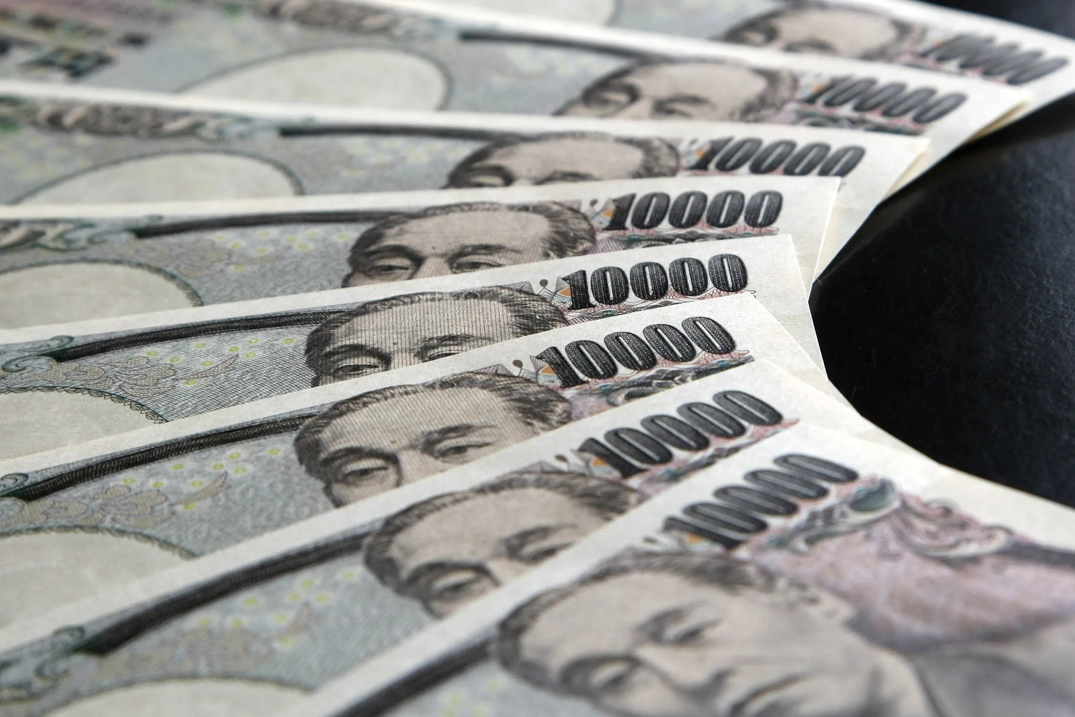 in Tokyo, Japan, on Tuesday, July 26, 2011. The dollar fell against the yen to the lowest level since March 17 as U.S. President Barack Obama addressed the nation on the economy.
