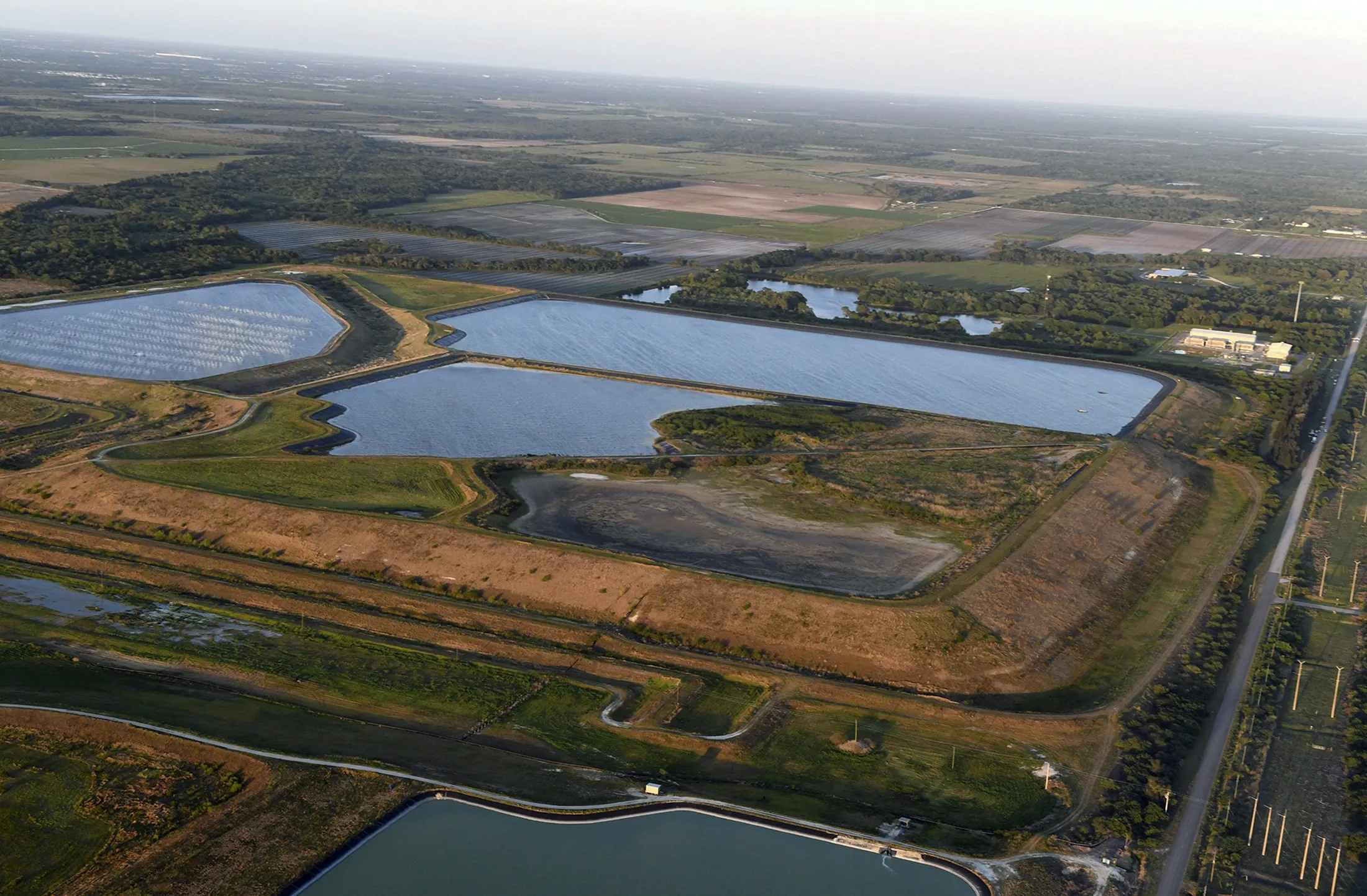 The old Piney Point phosphate mine in&nbsp;Florida. The pond sits&nbsp;in a stack of phosphogypsum, a radioactive waste product from manufacturing fertilizer.
