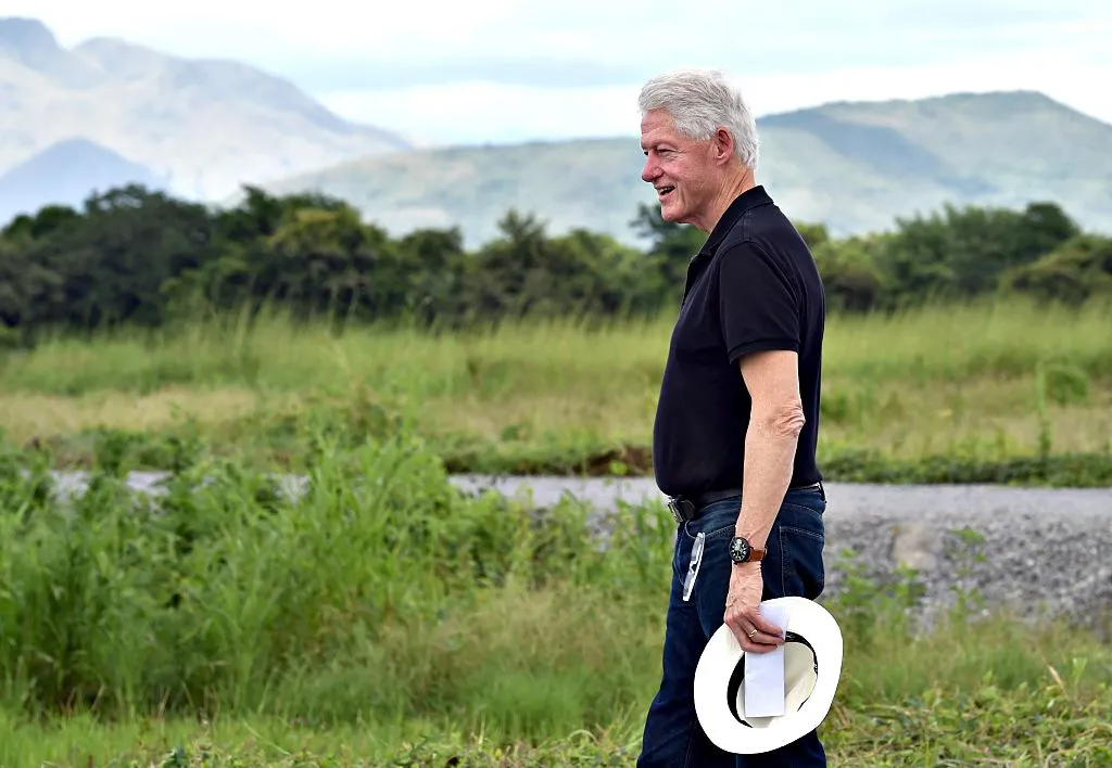 The theoretical trail is tangled, involving Bill Clinton and a Canadian businessman and "market-driven activities to meet the private sector’s requirements for optimization of local supply chains."
