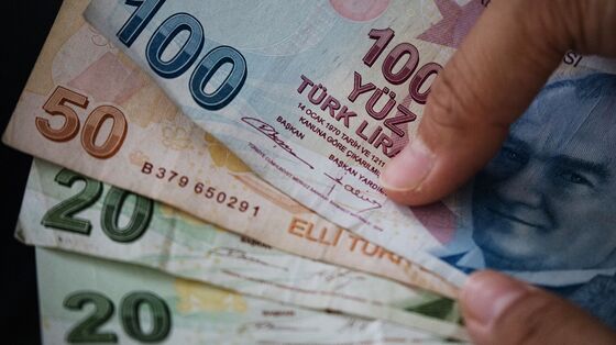 Turkey Slows Pace of Easing, Joins Negative Real-Rate Club