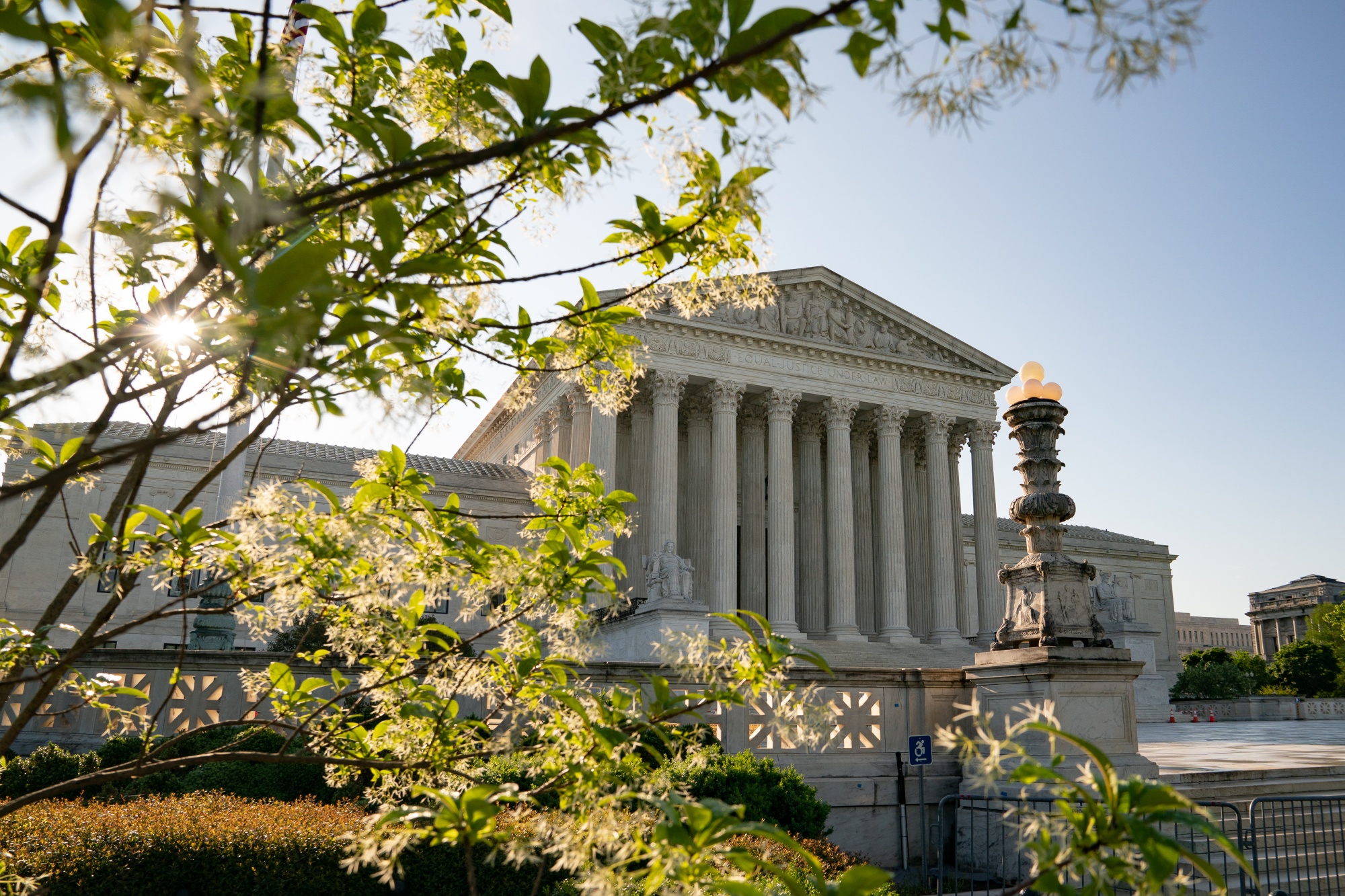 Biden’s Supreme Court Commission Sworn In, Holds First Session - Bloomberg