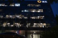 The Didi Global Inc. headquarters at night in Beijing.