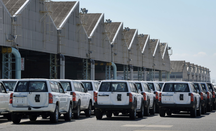 Nissan Motor Co. Patrol sport utility vehicles (SUV) bound for shipment sit at the company&#39;s facility at Honmoku Wharf in Yokohama City, Kanagawa Prefecture, Japan, on Saturday, July 16, 2011. Nissan Motor Co.&#39;s Chief Executive Officer Carlos Ghosn said the nation&#39;s second-biggest automaker will stick to its domestic output target even as the yen&#39;s strength may damp manufacturing in Japan. Photographer: Akio Kon&#x2F;Bloomberg
