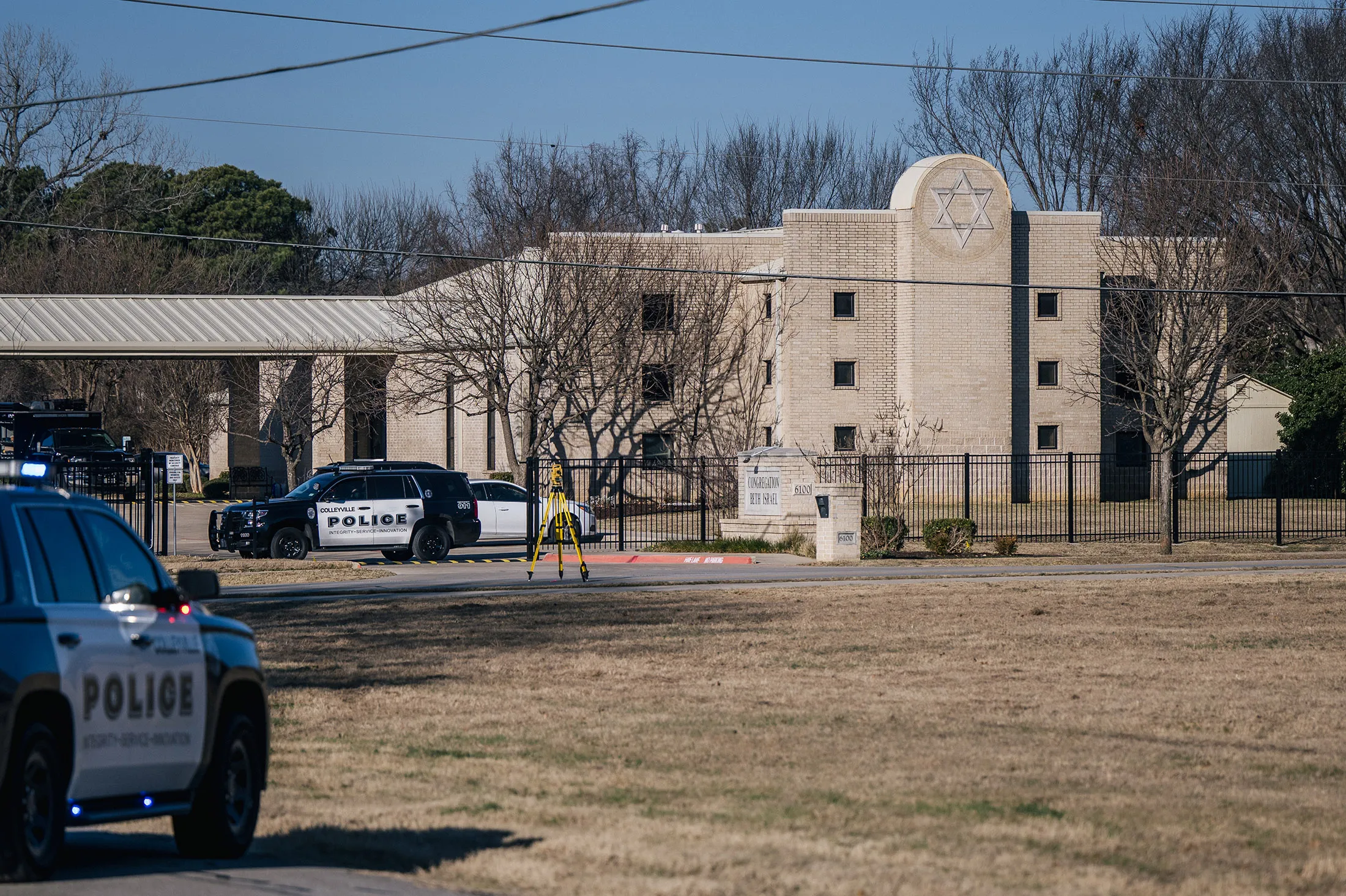 Law enforcement vehicles sit in front of the Congregation Beth Israel synagogue in&nbsp;Colleyville, Texas,&nbsp;on Jan.&nbsp;16.