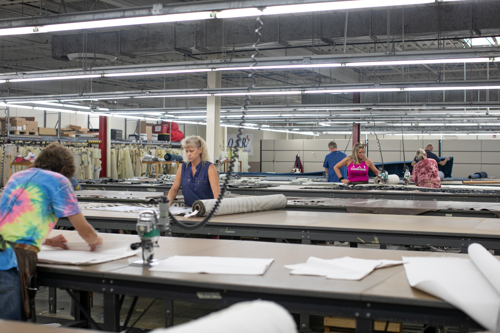 Employees cut out templates by hand at the CR Laine factory in Hickory, North Carolina, on Aug. 12.