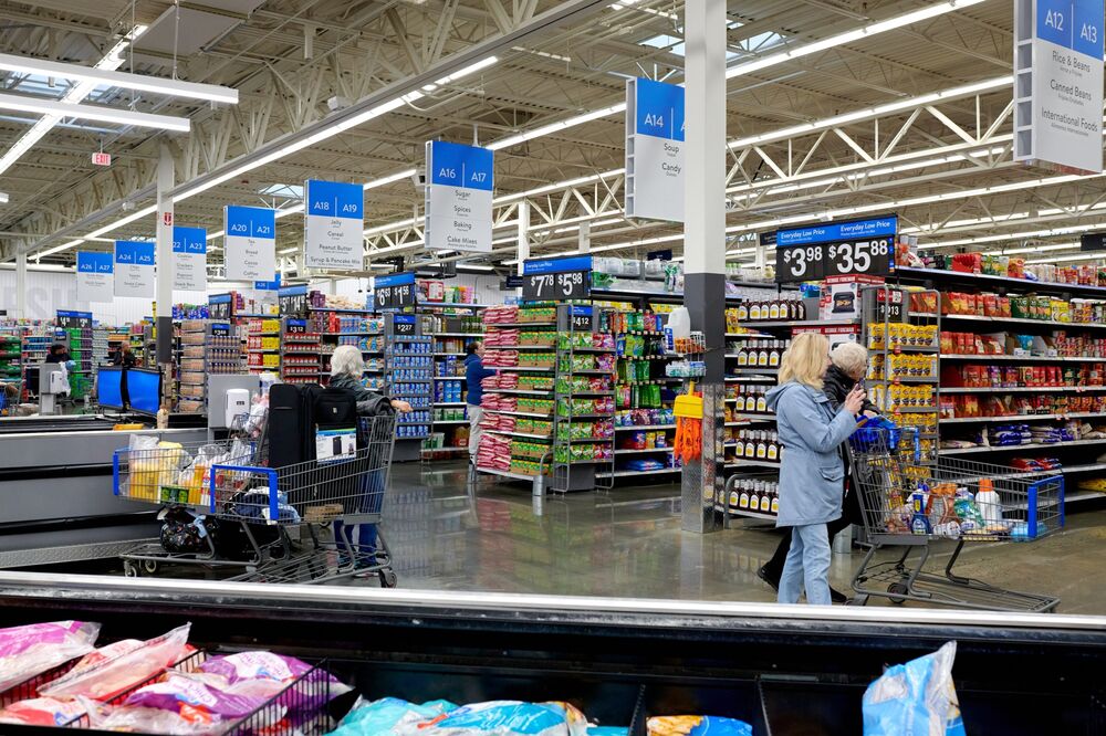 Customers shop for groceries at a Walmart store in Secaucus, New Jersey, US