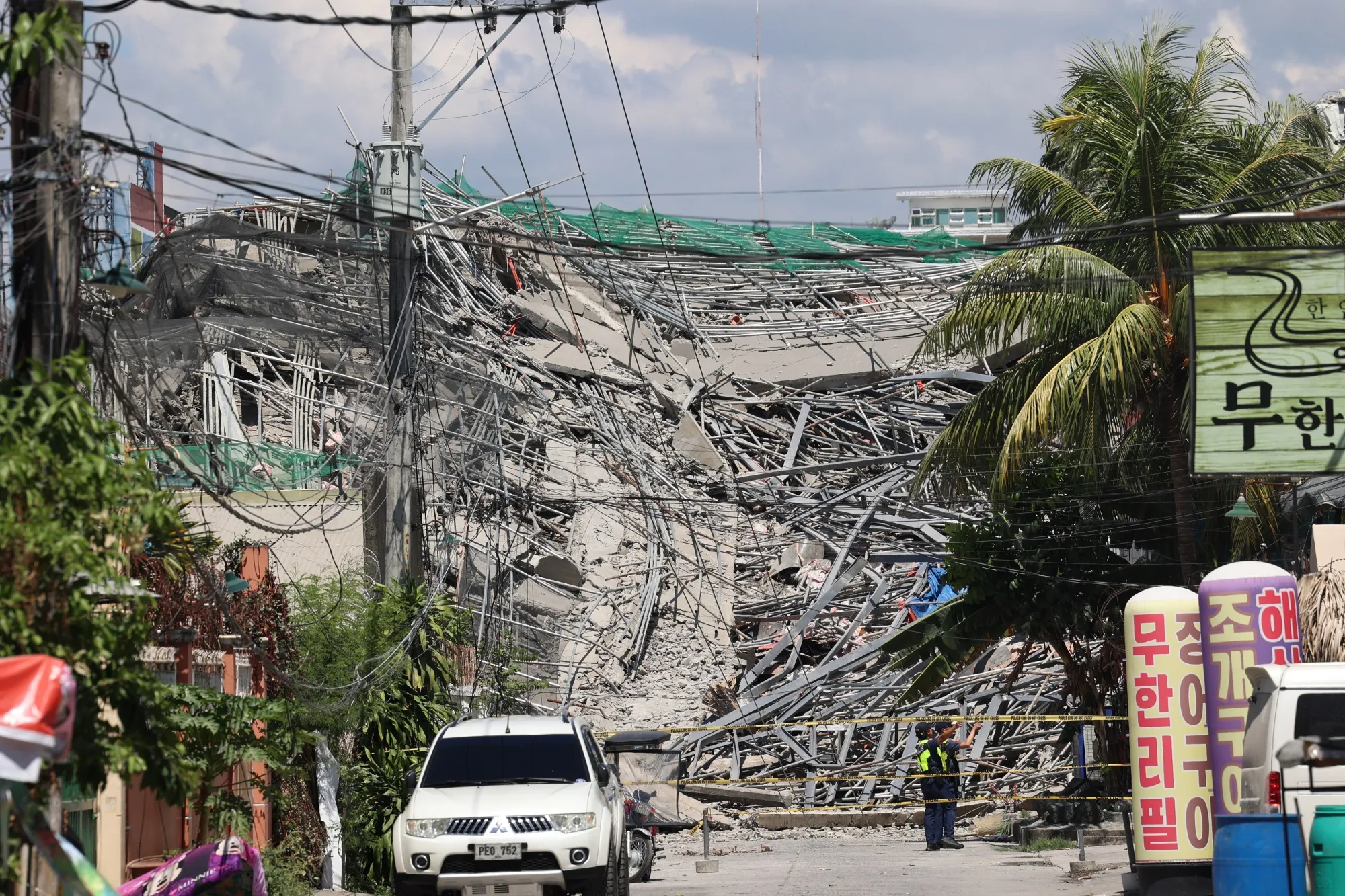 At Least 30 People Feared Trapped After Philippine Building Collapses ...